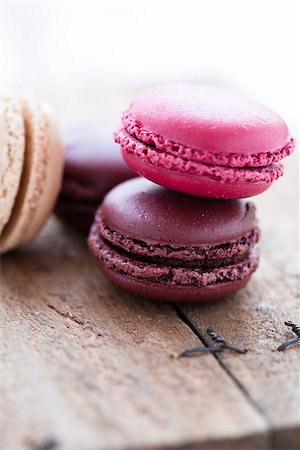 simsearch:400-06564979,k - Closeup of four different flavoured macaroons on wooden table Stock Photo - Budget Royalty-Free & Subscription, Code: 400-06697362