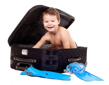 smile as mask for boy - little boy sitting in the luggage wearing snorkel gear Stock Photo - Budget Royalty-Free & Subscription, Code: 400-06697400