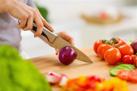 Closeup on housewife cutting red onion Stock Photo - Budget Royalty-Free & Subscription, Code: 400-06697838