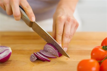 Closeup on woman cutting red onion Stock Photo - Budget Royalty-Free & Subscription, Code: 400-06697839