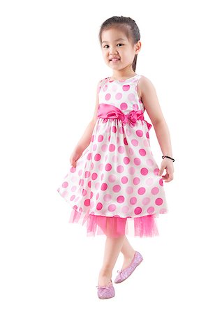 Full body Asian girl in pink dress dancing happily on white background Photographie de stock - Aubaine LD & Abonnement, Code: 400-06697985