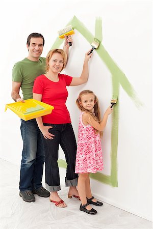 Family in their new house - making it a cozy home together concept Stock Photo - Budget Royalty-Free & Subscription, Code: 400-06698049