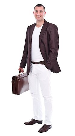 simsearch:400-04173616,k - Elegant businessman with brown bag in hand posing to camera Stockbilder - Microstock & Abonnement, Bildnummer: 400-06698378