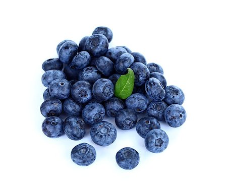 simsearch:400-06698338,k - Heap of fresh blueberries over white background Stock Photo - Budget Royalty-Free & Subscription, Code: 400-06698380