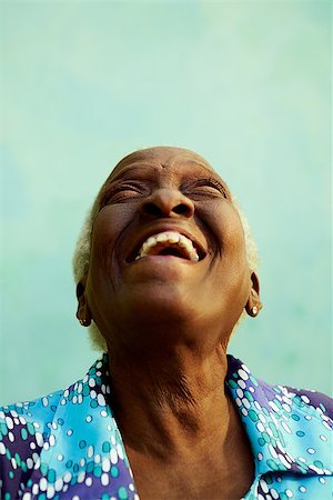 simsearch:400-06694838,k - Old people and emotions, portrait of bizarre senior african american lady laughing with head tilted up. Copy space Foto de stock - Royalty-Free Super Valor e Assinatura, Número: 400-06698768