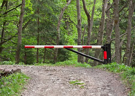 road stop alert - The barrier, blocking way to the forest Stock Photo - Budget Royalty-Free & Subscription, Code: 400-06699079