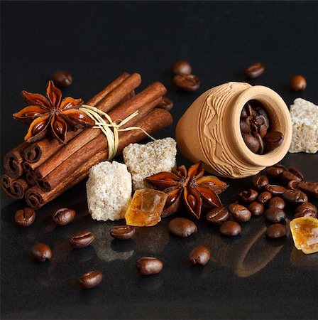 energy drink background - Roasted coffee beans, brown sugar and spices on a shiny black. Stock Photo - Budget Royalty-Free & Subscription, Code: 400-06699239