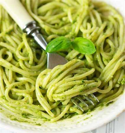 Italian pasta spaghetti with pesto sauce close-up Stock Photo - Budget Royalty-Free & Subscription, Code: 400-06699243