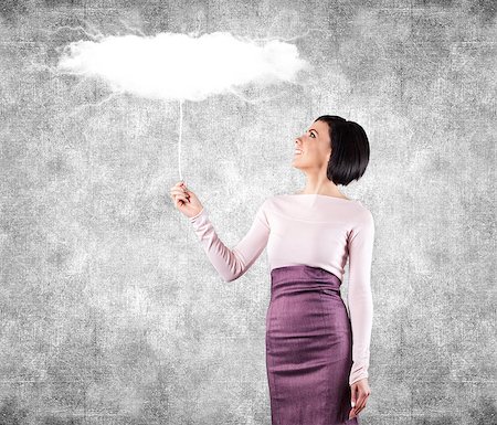 dreaming cloud girl - Girl holds a white cloud in a hand Stock Photo - Budget Royalty-Free & Subscription, Code: 400-06699405