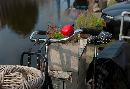 riding bike with basket - red bicycle bell on a vintage bicycle in zwolle, netherlands Stock Photo - Budget Royalty-Free & Subscription, Code: 400-06699679