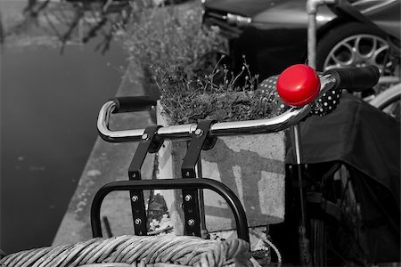 riding bike with basket - black and white image of a red bicycle bell on a vintage bicycle in zwolle, netherlands Stock Photo - Budget Royalty-Free & Subscription, Code: 400-06699680