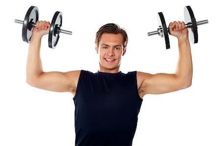 simsearch:400-06859184,k - Caucasian athlete exercising in sporty outfits, lifting weights Stockbilder - Microstock & Abonnement, Bildnummer: 400-06699788