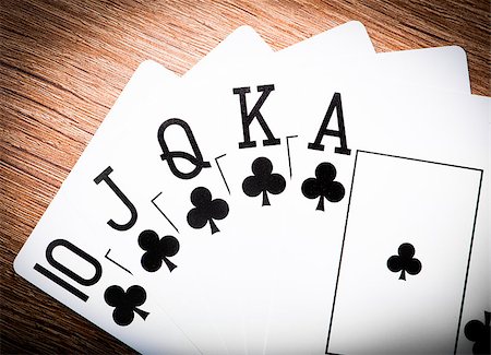 Royal flash on red poker table Stock Photo - Budget Royalty-Free & Subscription, Code: 400-06699852