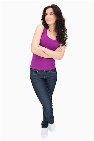 simsearch:400-06690896,k - Brunette in purple top tank looking up against white background Stock Photo - Budget Royalty-Free & Subscription, Code: 400-06690987