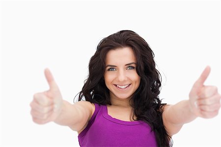 simsearch:400-06690896,k - Beautiful student the thumbs-up against white background Stock Photo - Budget Royalty-Free & Subscription, Code: 400-06690993