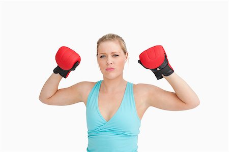 simsearch:400-06876600,k - Woman rising her gloves against white background Stock Photo - Budget Royalty-Free & Subscription, Code: 400-06691467