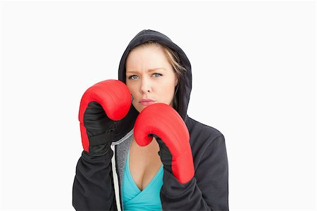 simsearch:400-06876600,k - Serious woman boxing against white background Stock Photo - Budget Royalty-Free & Subscription, Code: 400-06691505