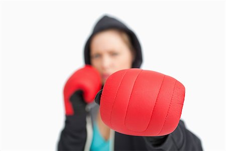 simsearch:400-06876600,k - Woman fuzzy showing a boxing glove against white background Stock Photo - Budget Royalty-Free & Subscription, Code: 400-06691501
