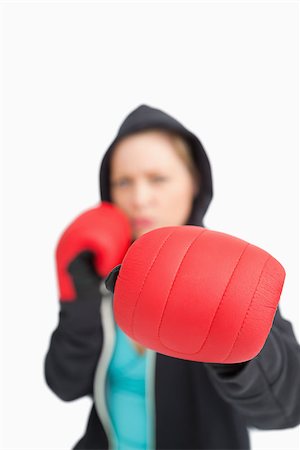 simsearch:400-06876600,k - Woman boxing with a red gloves against white background Stock Photo - Budget Royalty-Free & Subscription, Code: 400-06691502