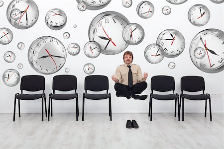 simsearch:400-06556699,k - Project manager juggling with deadlines - surrounded by distorted wall clock bubbles Foto de stock - Royalty-Free Super Valor e Assinatura, Número: 400-06691768