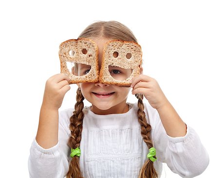 simsearch:400-05701644,k - Happy little girl with plenty of food - welfare concept, isolated Stock Photo - Budget Royalty-Free & Subscription, Code: 400-06691771