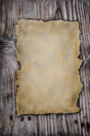 Old paper on rustic wooden background Stock Photo - Budget Royalty-Free & Subscription, Code: 400-06693401