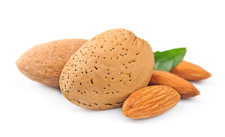simsearch:400-04173906,k - Almonds nuts closeup on white Stock Photo - Budget Royalty-Free & Subscription, Code: 400-06693864