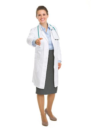 doctor shaking hands full body - Happy medical doctor woman stretching hand for handshake Photographie de stock - Aubaine LD & Abonnement, Code: 400-06701190