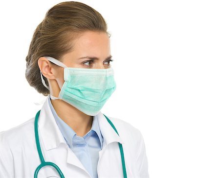 simsearch:400-04129952,k - Medical doctor woman in mask looking on copy space Stockbilder - Microstock & Abonnement, Bildnummer: 400-06701614