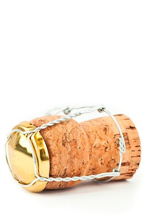 stopper - Close up of a cork with iron wire against a white background Stock Photo - Budget Royalty-Free & Subscription, Code: 400-06734035