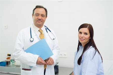 simsearch:400-06734647,k - Patient and doctor together in an examination Stock Photo - Budget Royalty-Free & Subscription, Code: 400-06734125