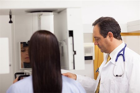 Doctor conducting a mammography on a patient  in an examination room Stock Photo - Budget Royalty-Free & Subscription, Code: 400-06734133