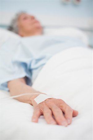 Focus on the hand of a patient in hospital ward Stock Photo - Budget Royalty-Free & Subscription, Code: 400-06734198