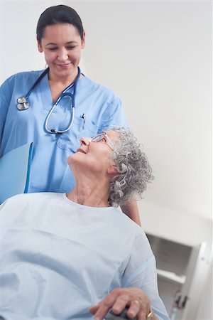 simsearch:400-07337135,k - Elderly patient in a wheelchair in hospital ward Stock Photo - Budget Royalty-Free & Subscription, Code: 400-06734415