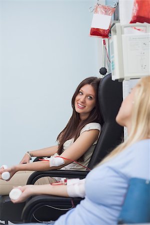 simsearch:400-06734658,k - Two patients receiving a transfusion in hospital ward Stock Photo - Budget Royalty-Free & Subscription, Code: 400-06734570