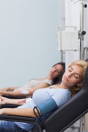 simsearch:400-06734658,k - Two patients sleeping in hospital ward Stock Photo - Budget Royalty-Free & Subscription, Code: 400-06734572