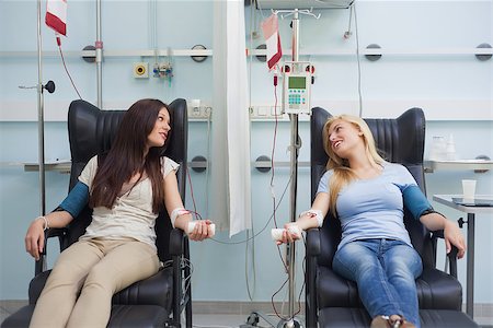 simsearch:400-06734658,k - Patient talking to another patient in hospital ward Stock Photo - Budget Royalty-Free & Subscription, Code: 400-06734852