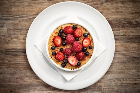 photos of blueberries for kitchen - Creme brulee with strawberries and blueberries Stock Photo - Budget Royalty-Free & Subscription, Code: 400-06735636