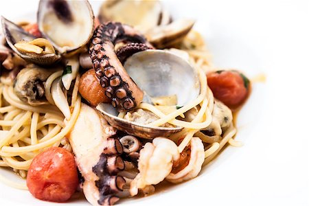 Pasta with octopus, mussles and other seafood Stock Photo - Budget Royalty-Free & Subscription, Code: 400-06735654