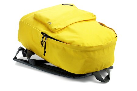 simsearch:400-07046956,k - Yellow Backpack Lying on White Background Stock Photo - Budget Royalty-Free & Subscription, Code: 400-06735721