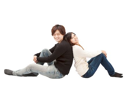 young asian couple sitting together and isolated on white Stock Photo - Budget Royalty-Free & Subscription, Code: 400-06736407