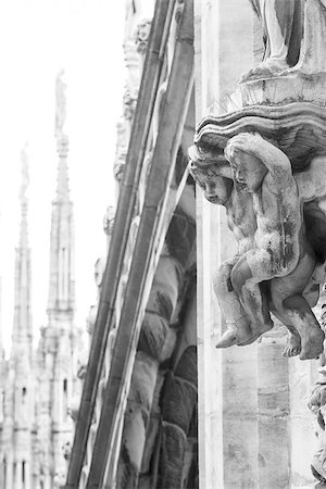 simsearch:400-06173987,k - Detail of the landmark of Milano - Italy: the famous Duomo, the main church of the town Stock Photo - Budget Royalty-Free & Subscription, Code: 400-06736752