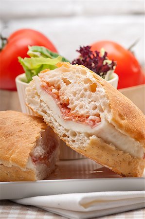 simsearch:400-06641159,k - Italian ciabatta panini sandwich with parma ham and tomato Foto de stock - Super Valor sin royalties y Suscripción, Código: 400-06736896