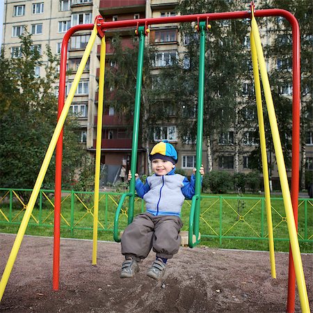 small babies in park - little boy teeter on playground at autumn Stock Photo - Budget Royalty-Free & Subscription, Code: 400-06737087