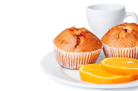 Two muffins and orange slices on a white background Stock Photo - Budget Royalty-Free & Subscription, Code: 400-06737303