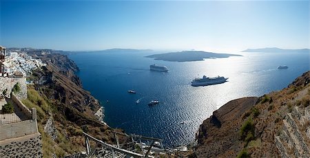 stair for mountain - At the top of the mountain of Santorini, white walls of the city are located Fira. From its terrace offers a magnificent view of the caldera Stock Photo - Budget Royalty-Free & Subscription, Code: 400-06737689