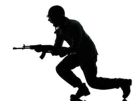 run gun - one caucasian army soldier man attacking on studio isolated on white background Stock Photo - Budget Royalty-Free & Subscription, Code: 400-06737798