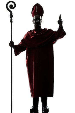 priest blessing - one man cardinal bishop silhouette saluting blessing in studio isolated on white background Stock Photo - Budget Royalty-Free & Subscription, Code: 400-06737827