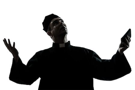 simsearch:614-02764159,k - one caucasian man priest silhouette in studio isolated on white background Stockbilder - Microstock & Abonnement, Bildnummer: 400-06737837