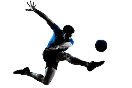football flying - one caucasian man flying kicking playing soccer football player silhouette  in studio isolated on white background Stock Photo - Budget Royalty-Free & Subscription, Code: 400-06738026